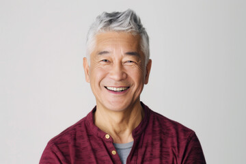Portrait of old healthy, cheerful handsome Asian senior man smiling and looking at camera with white background. Happy aging society, retirement, teeth, health and senior healthcare concept - obrazy, fototapety, plakaty