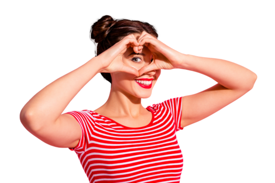 Close up photo beautiful she her lady pretty two buns pomade lips hold hands arms heart shape figure near eye hide face cardiac health wear casual striped red white t-shirt isolated pink background