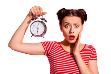 Close-up portrait of her she nice cute charming winsome lovely attractive worried girl wearing striped t-shirt holding showing clock oops omg isolated over pink pastel background