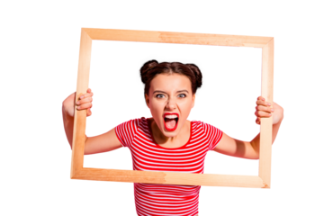 Portrait of her she nice cute charming attractive glamorous aggressive girl in striped t-shirt holding in hands wooden frame trying to break rules borders life lifestyle isolated over pink background