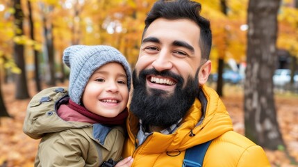 A man and a child are smiling and posing for a picture in a park - obrazy, fototapety, plakaty