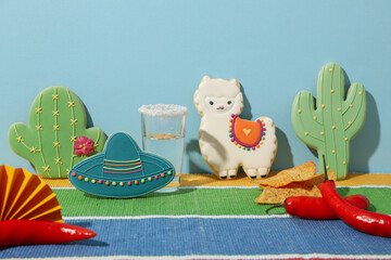 A shot of tequila with nachos and decorations