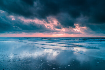 Seascape with dramatic sky and dark clouds above the North Sea - 755550911