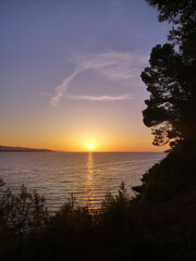 Fototapeta na wymiar Beautiful sunset at Zlatni Rat, Brac, Croatia