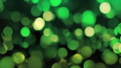 Obraz premium Abstract blur bokeh banner background. Gold bokeh on defocused Black and Green background
