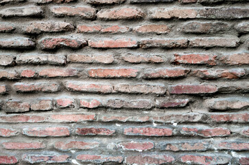 pattern texture of old vintage orange brick wall close up