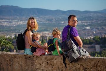 Family of four enjoy panoramic Alhambra view, Granada, Spain - 755575352