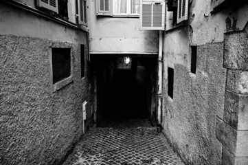 Fotobehang narrow street in the town © nikolas