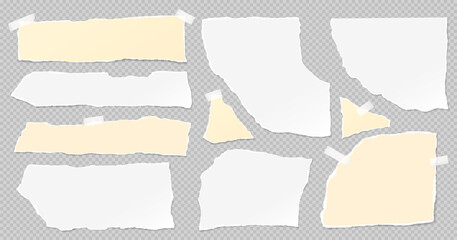 Set of torn white and yellow note paper pieces are on grey background for text or ad.