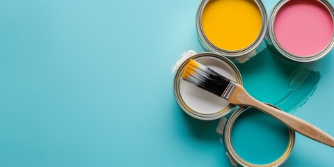 A row of paint cans with a paint brush in the middle