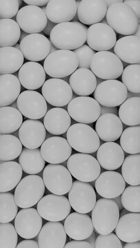 Abstract 3D animation of a lot of falling white eggs. Vertical orientation. Food Set