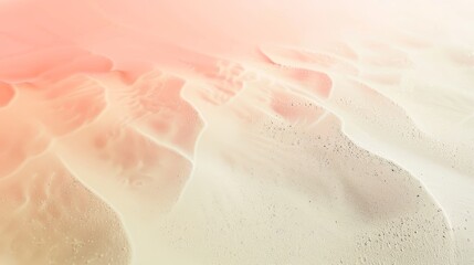 Fototapeta premium A gradient background from coral to ivory with a fine sand texture