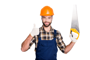 Portrait of handsome joyful master in hard hat, uniform, overall, shirt with stubble, showing thumb up, like sign holding having saw in arm, isolated on grey background