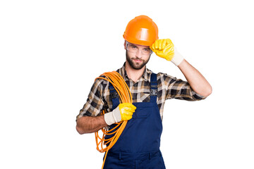 Portrait of virile harsh electrician with bristle in overall, shirt, having rolled cable on...