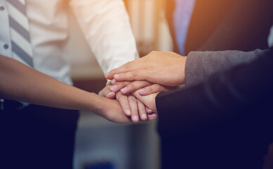 Fototapeta premium Hands together, teamwork, cooperation and unity in work and success in work.