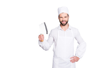 Portrait of positive cheerful handsome butcher having cleaver in arm holding hand on waist, looking at camera, isolated on grey background