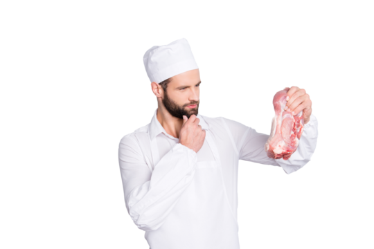 Portrait of pensive thoughtful butcher having fresh meat in hand looking at tenderloin holding hand on chin isolated on grey background