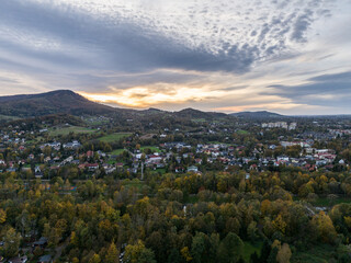 Scenery of the town and health resort in Ustron on the hills of the Silesian Beskids, Poland. Aerial drone view of beskid mountains in Ustron. Ustron Aerial View.