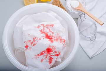 Homemade eco-friendly removing of stains on clothes with baking soda. Natural cleaning products. daily life stain concept. top view. 