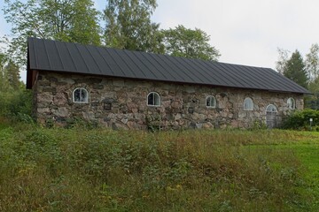View of old traditional style stone barn, Finland.