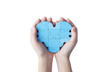 A blue heart in the child hands isollated on the transparent background.
