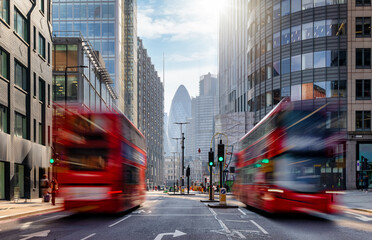 Long exposure view of Liverpool Street in the City of London with bus traffic and office...