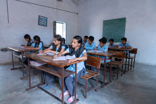 Rural indian students studying in classroom school. Education and knowledge concept.  India. 