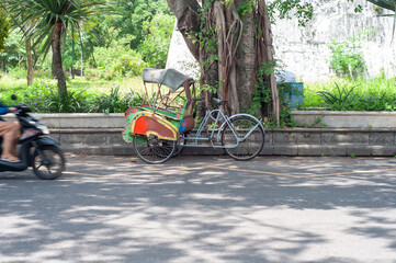 Fototapeta na wymiar rickshaw on the side of the road