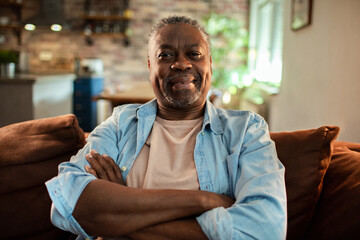 Portrait of a smiling mature African American man relaxing at home