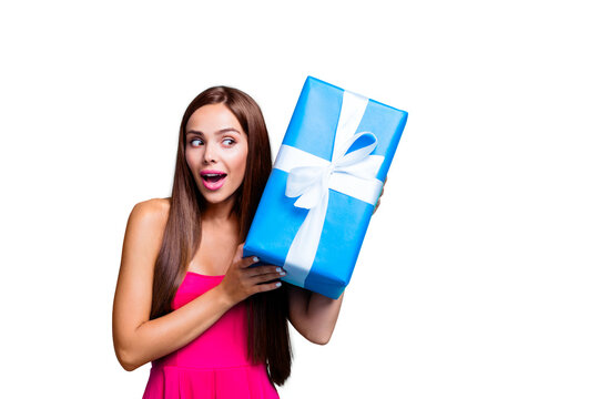 Curiosity people person concept. Close up photo portrait of cute cunning sly naive lady trying to guess what is hid inside the package isolated on bright vivid shine background copy space