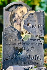 Two jewish tombstones pierced by one bullet during WW2 [3] - obrazy, fototapety, plakaty