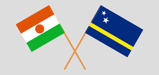 Crossed flags of Niger and Country of Curacao. Official colors. Correct proportion