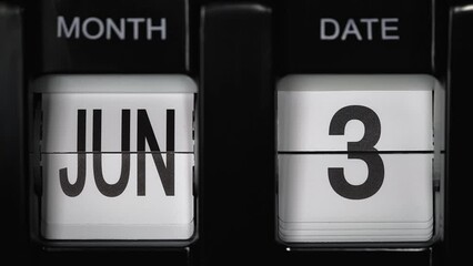 retro flip calendar with a date change from the second of June to the third of June. daily calendar with a change of days of the month. close up.