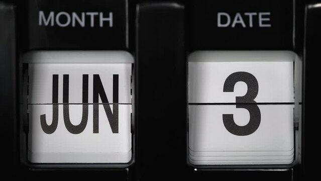 retro flip calendar with a date change from the second of June to the third of June. daily calendar with a change of days of the month. close up.