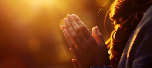Serene Woman Praying in Warm Golden Light