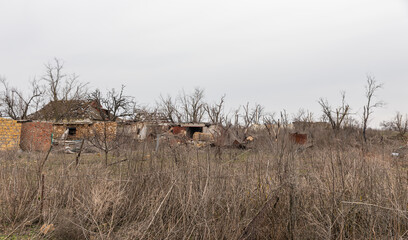 Fototapeta premium Consequences of regular shelling in a village in Ukraine