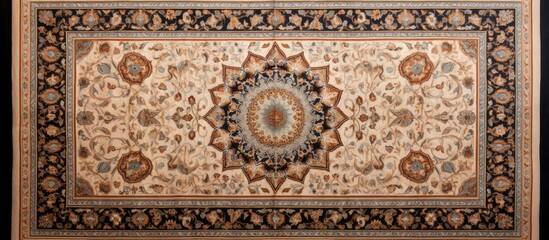 A large rug featuring an intricate design with original light brown shades. The rug adds elegance and sophistication to the room, showcasing detailed patterns and craftsmanship.