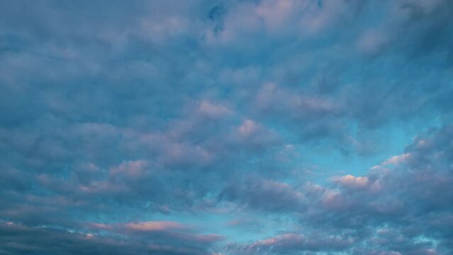 Cirrocumulus cloud in evening. Beautiful and relaxing clouds with a dark blue afternoon sky.