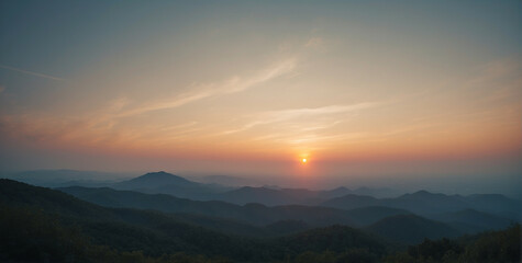 Sun Setting Over Mountain Range