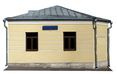 Yellow stone city barn with iron roof isolated