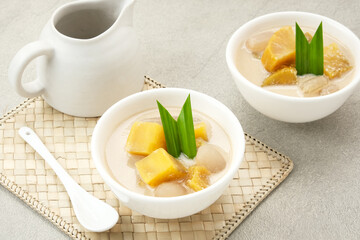 Kolak Ubi, Indonesian traditional dessert, made from sweet potato, coconut milk, sugar and pandanus leaves. 
