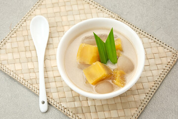 Kolak Ubi, Indonesian traditional dessert, made from sweet potato, coconut milk, sugar and pandanus leaves. 
