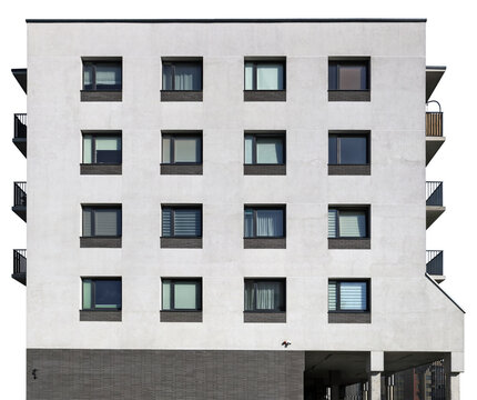 Sixteen windows are located on the side wall of a residential building isolated