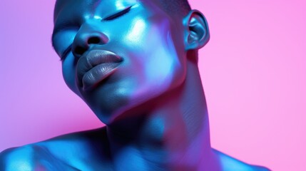 Young handsome black model with a trendy neon make up and light
