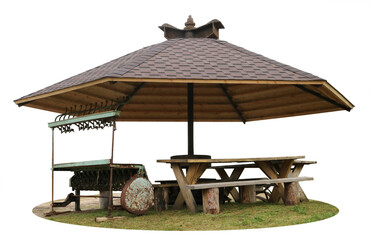 Wooden table benches and umbrella in a rustic relaxation area