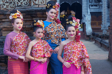 Pretty Asian women wearing ancient native Northern Thai dress costumes according to Thai culture...