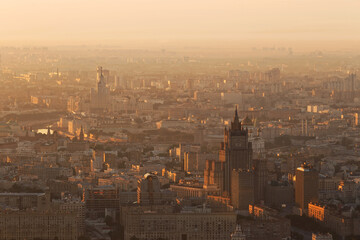 Naklejka premium Panorama with Stalin skyscrapers (MID, house on Kotelnicheskaya quay) during sunrise in Moscow, Russia