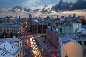 Ilinka street in center of Moscow, Kremlin far away at cloudy morning in Russia