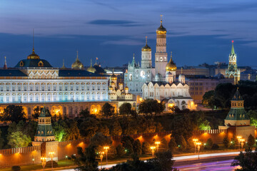 Kremlin wall, Ivan Great bell tower and Grand Kremlin Palace at evening in Moscow, Russia
