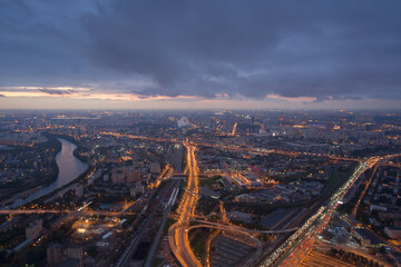 Highways, tall buildings, river at evening in Moscow, Russia, panoramic view